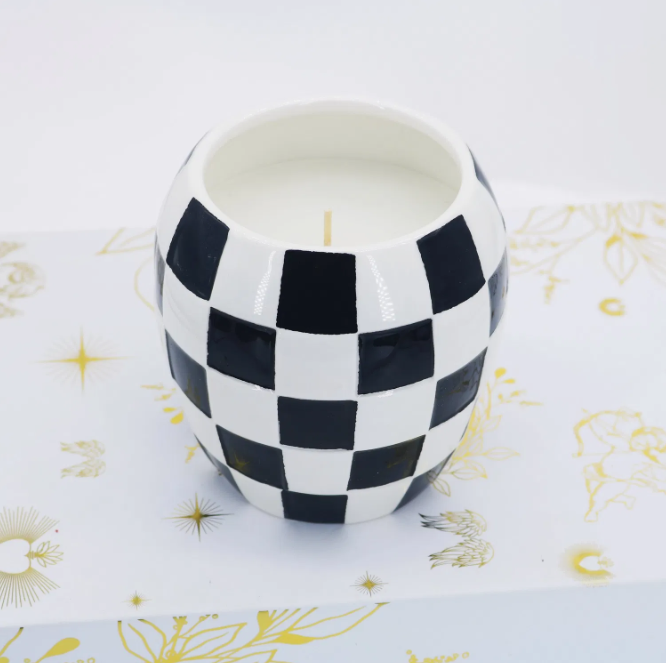 black and white checkered ceramic vessel.PNG