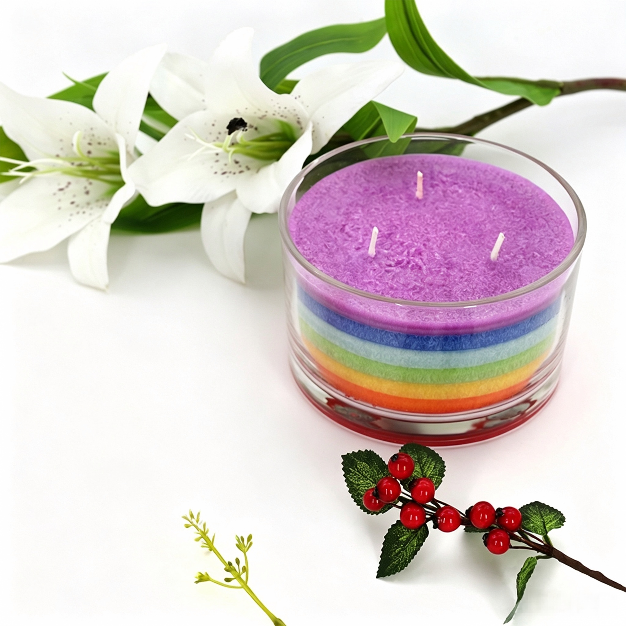 color-block candle layers in clear glass jars on a retail shelf.png