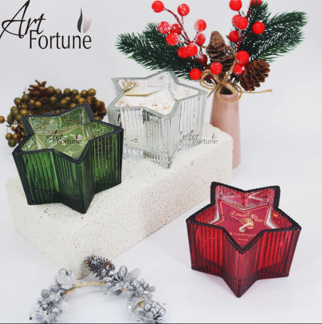 star ribbed glass scented candles in red, green, amber and clear Christmas colorways.PNG